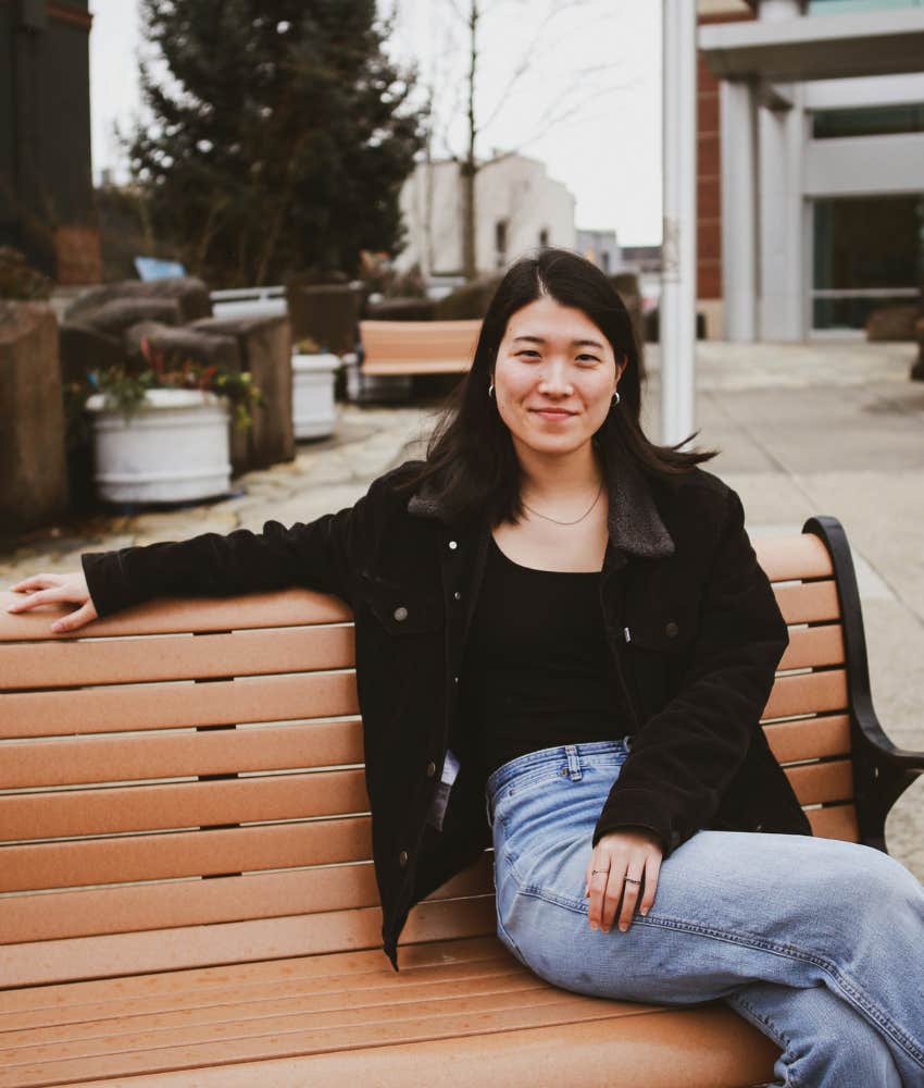 woman sitting on bench 