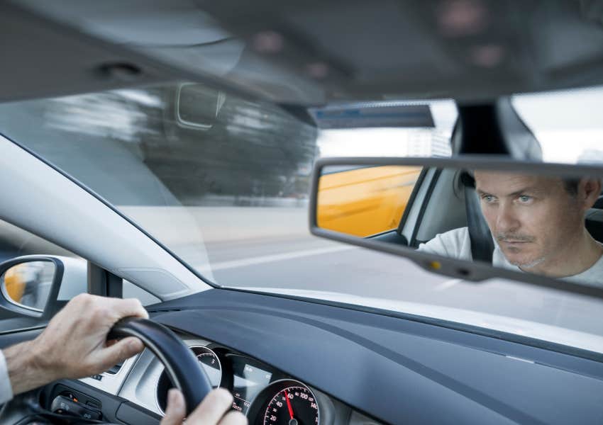serious man driving fast