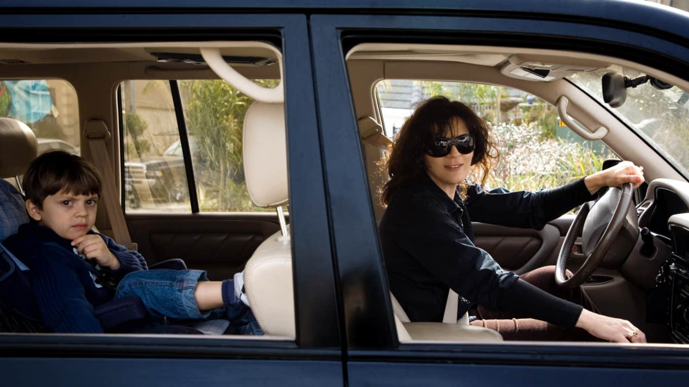 'Angry' Dad Follows A Mom And Her 10-Year-Old Son Home After School Pickup To Confront The Boy mom driving with her son in the backseat