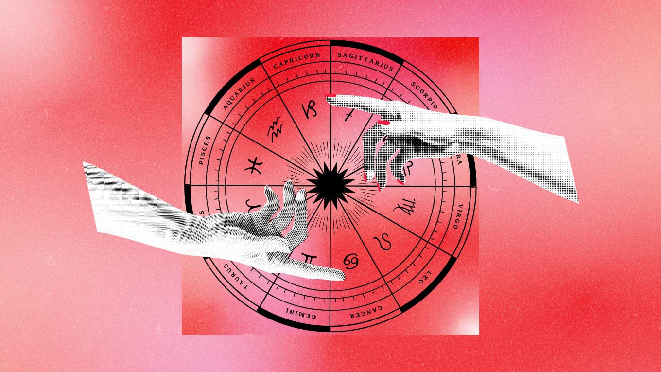 two hands reaching over zodiac wheel