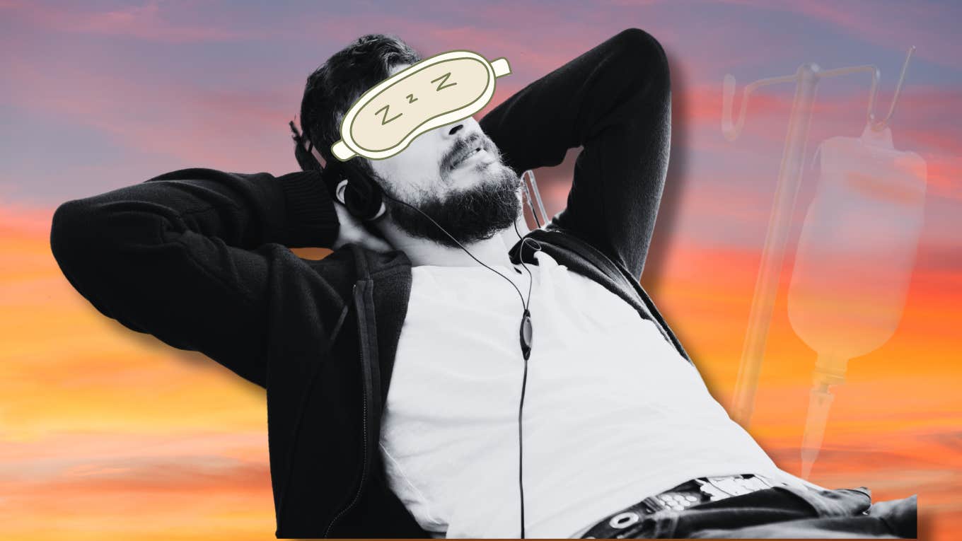 Man reclining in chair with headphones and eye mask, ketamine assisted therapy 