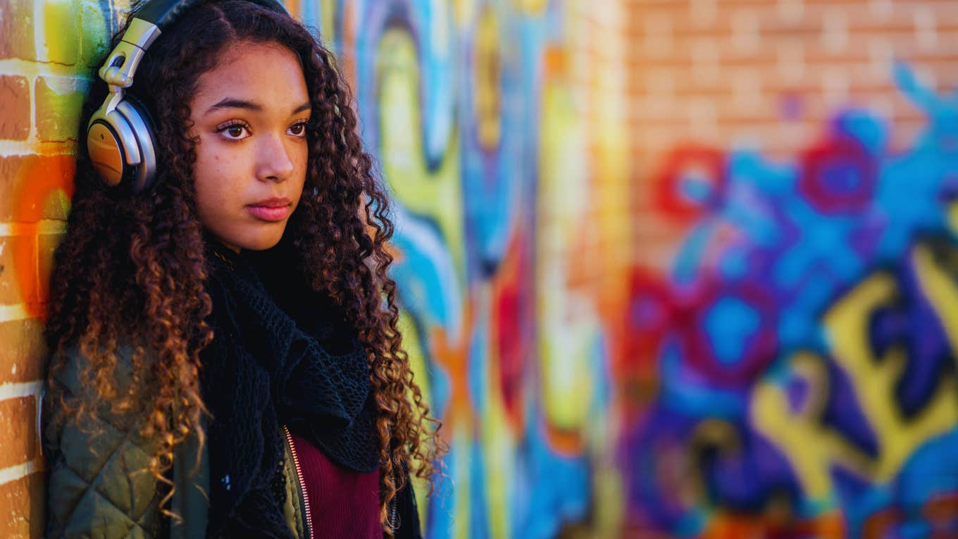 teenager wearing headphones