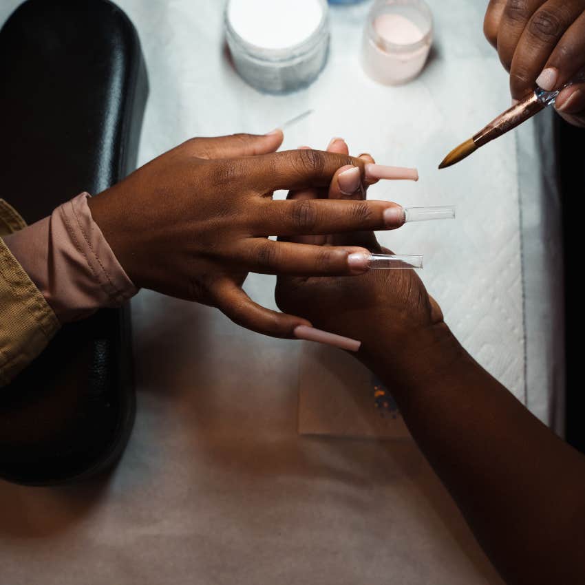 woman getting a gel manicure