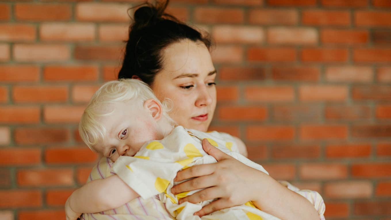 woman holding a baby