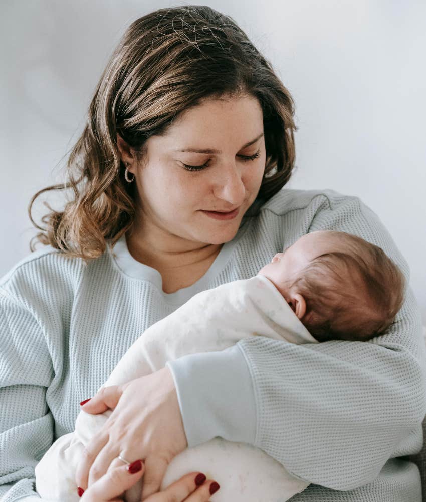 woman holding baby