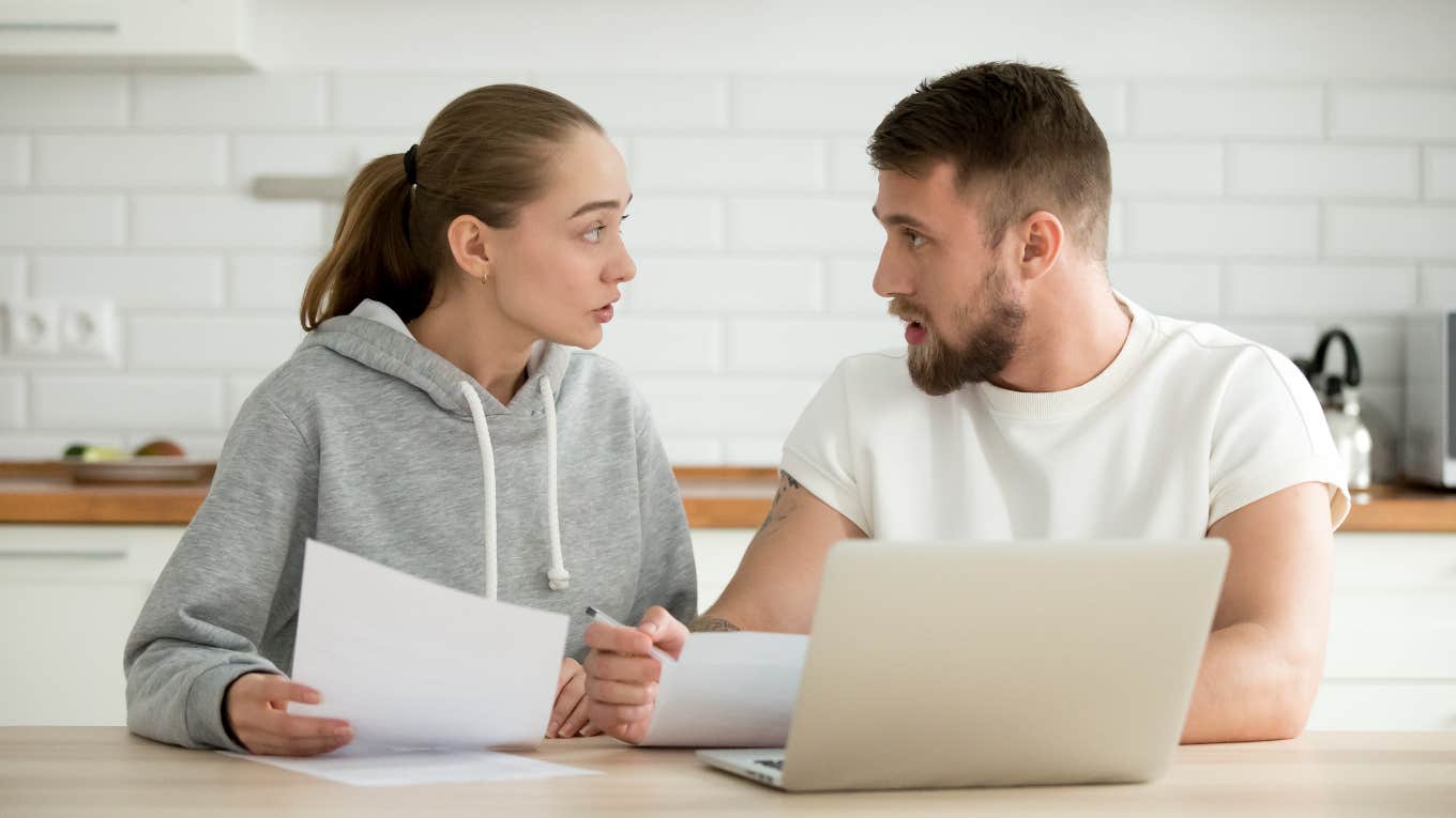 Man Can't Deal With His Wife Becoming The Breadwinner Young couple fighting about finances because wife is becoming the breadwinner