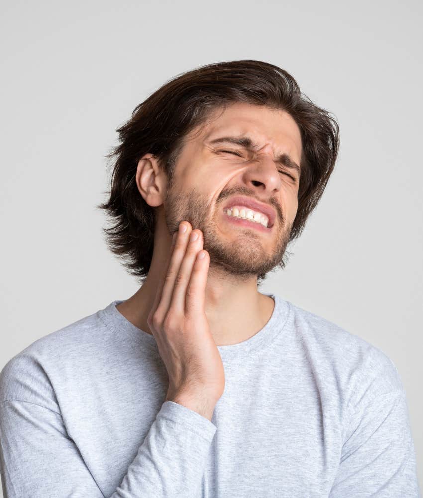 man with jaw pain