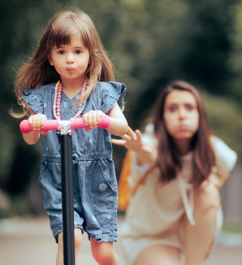 Parenting style mother is worried about child on bicycle