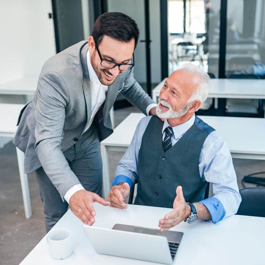 worker laughing with his boss