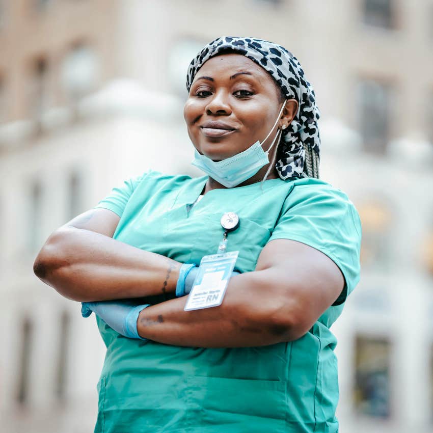 nurse standing outside hospital 