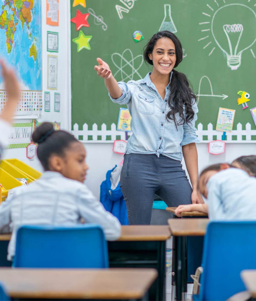 teacher at the front of the classroom