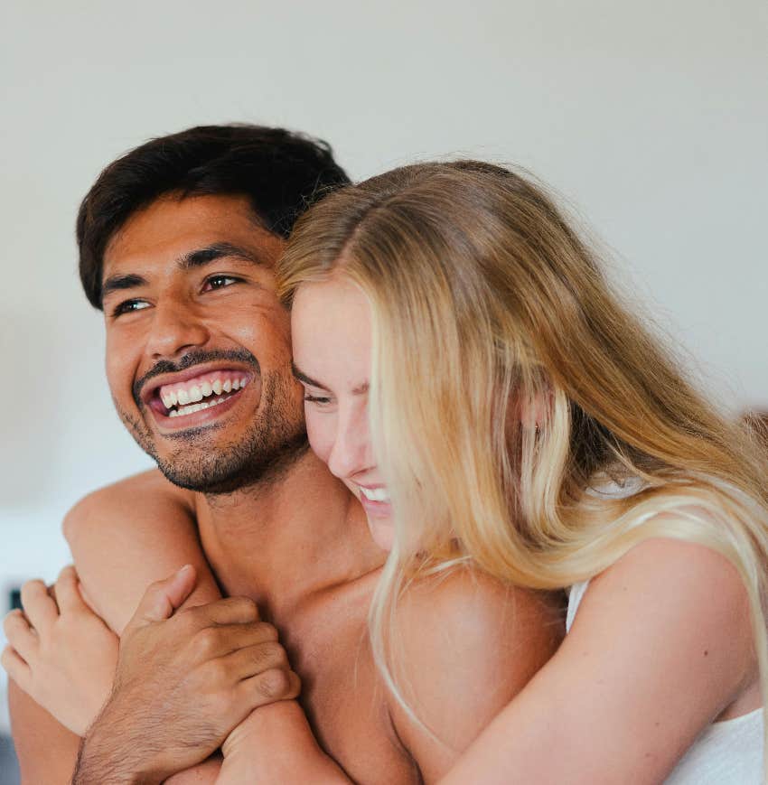 woman making man smile