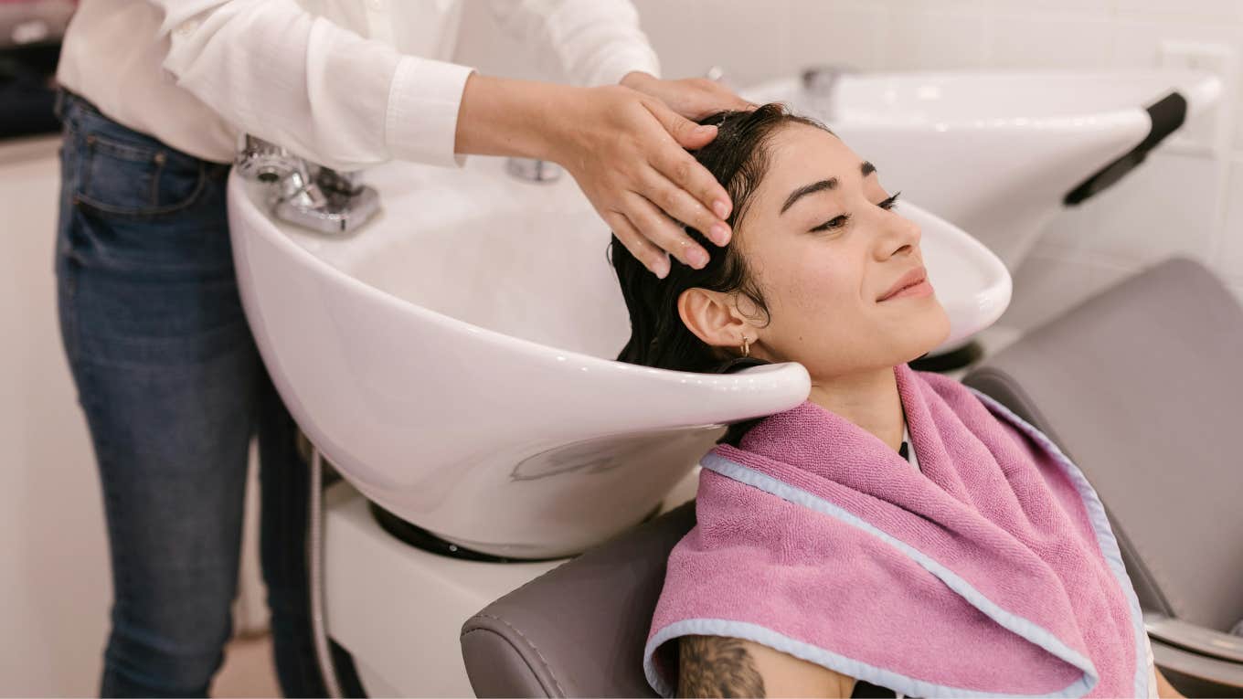 woman getting hair done