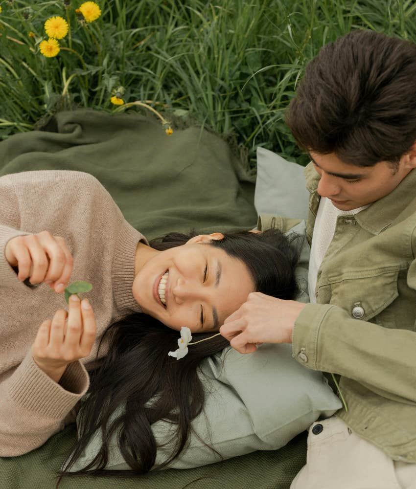 man and woman on picnic