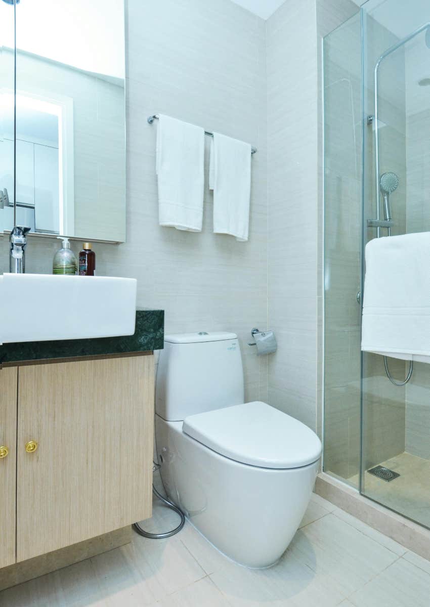 bathroom with a toilet in the corner