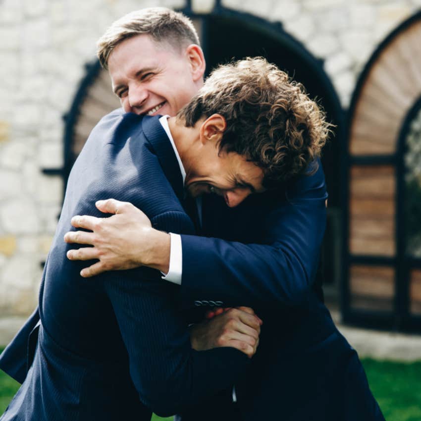 groom, best man, hugging