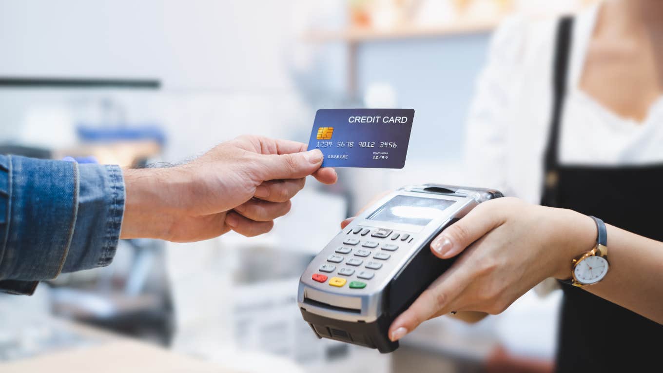 Boss Confronts Worker For Using Company Credit Card To Buy Her Groceries person using credit card to pay for purchase