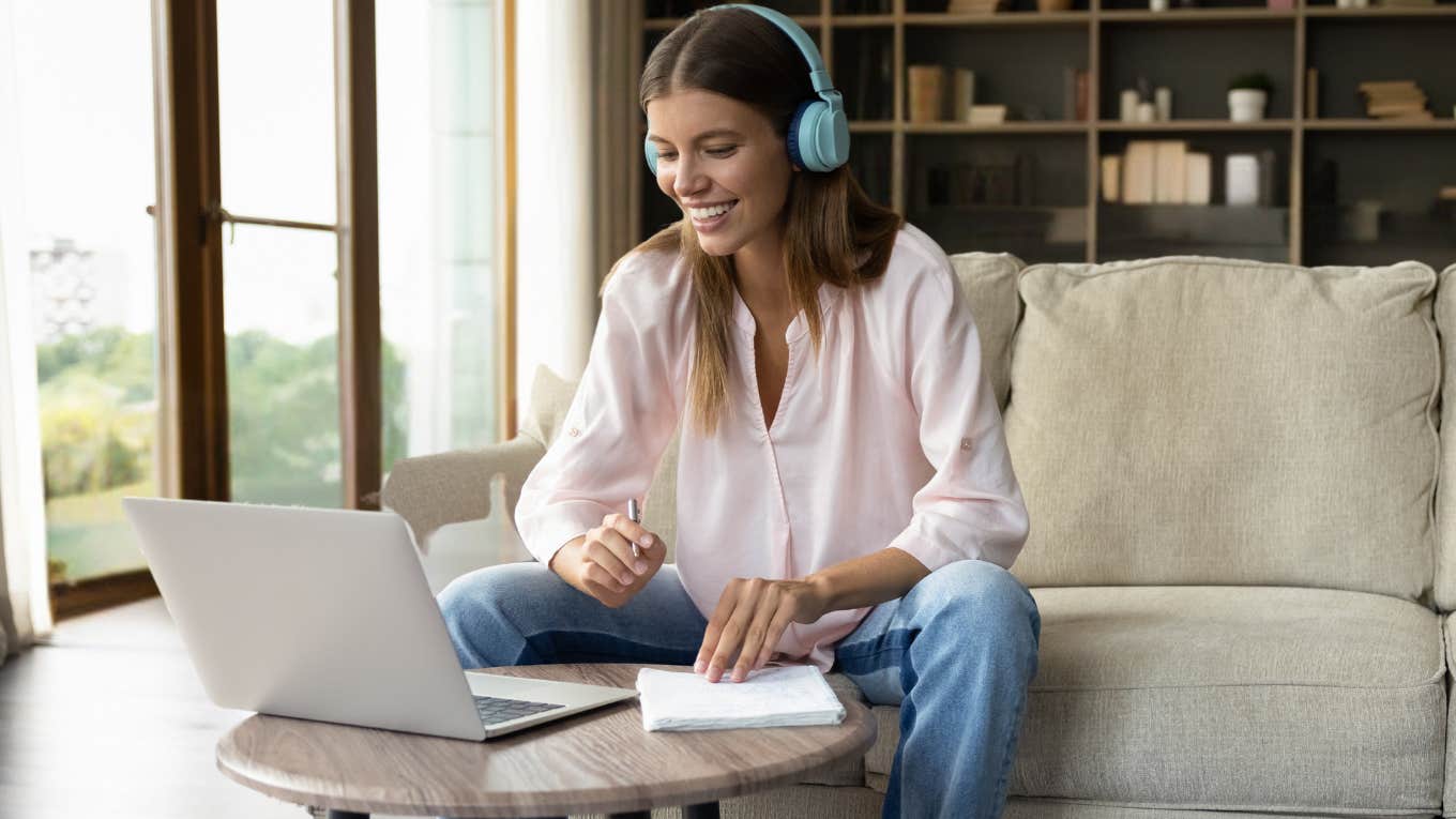 Gen Z employee working on her laptop. 