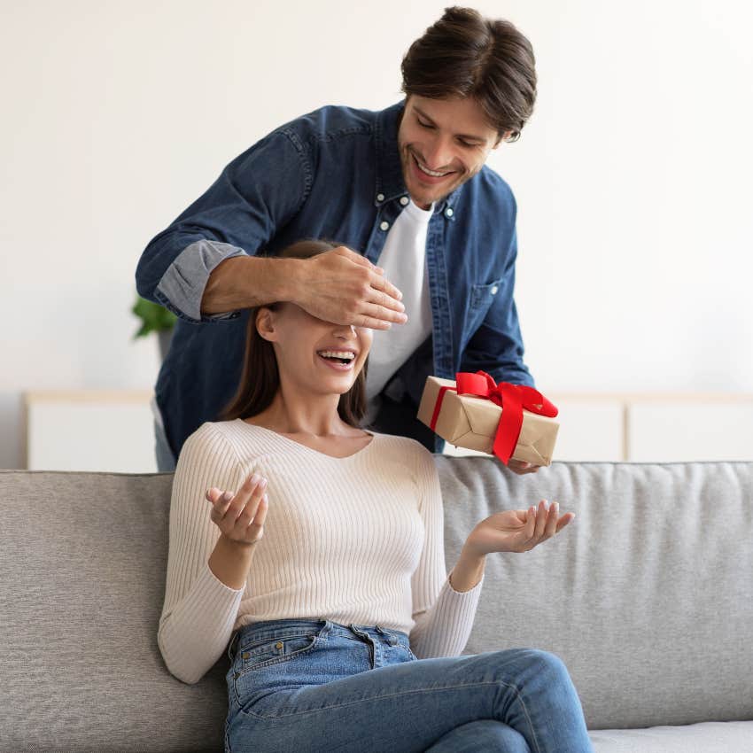 Boyfriend giving his girlfriend a gift