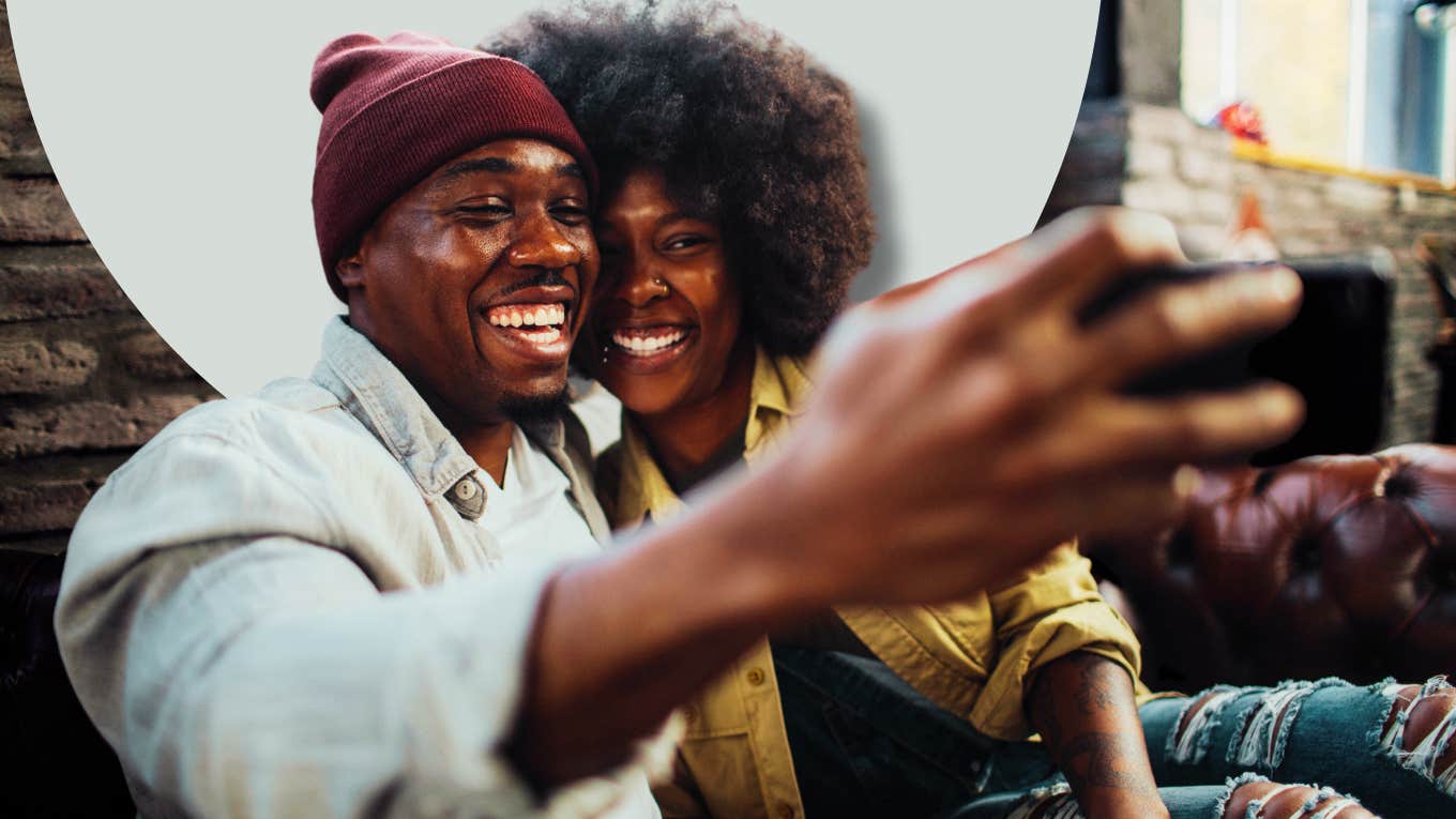 Couple on date night, taking a selfie, dressed up-- having fun