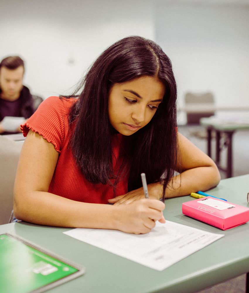 college student taking exam