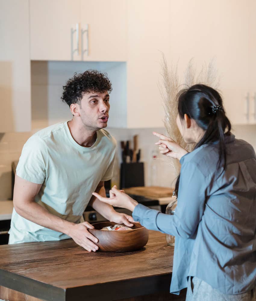 couple arguing in kitchen