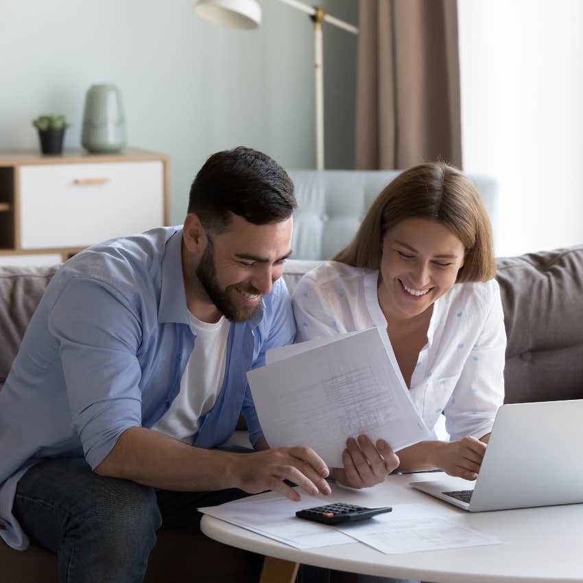 Couple discussing finances after a raise