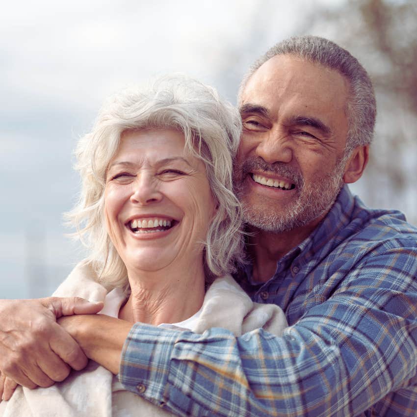 couple hugging and smiling