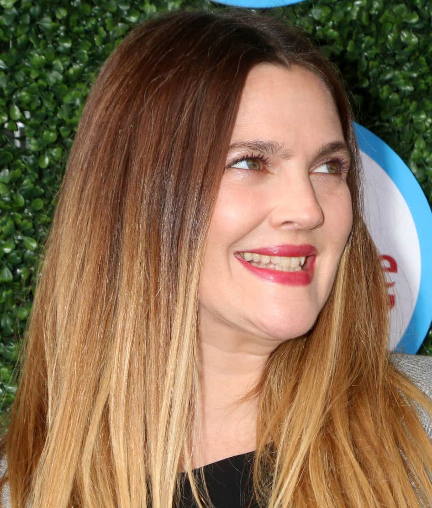 Drew Barrymore with a large grin