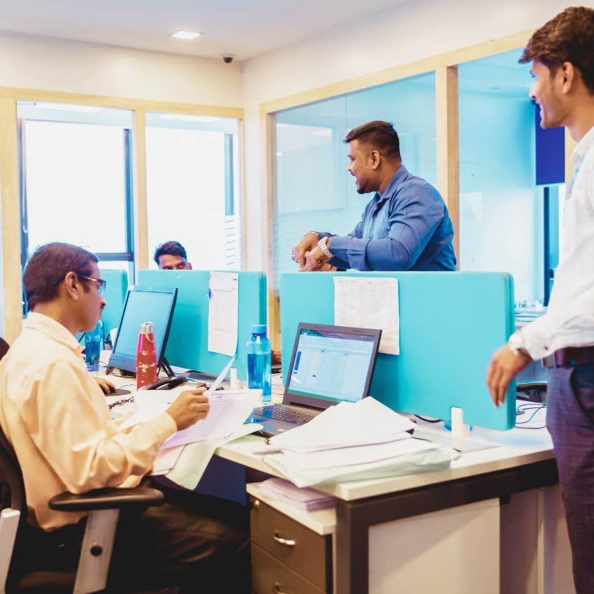 employees working in cubicles