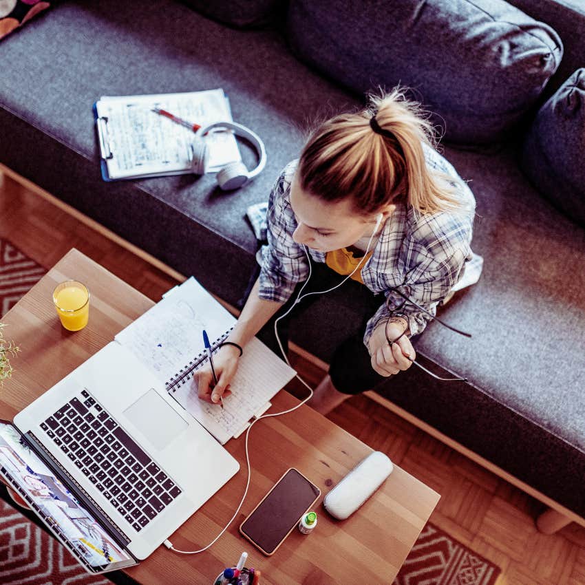 Gen Z woman working on laptop