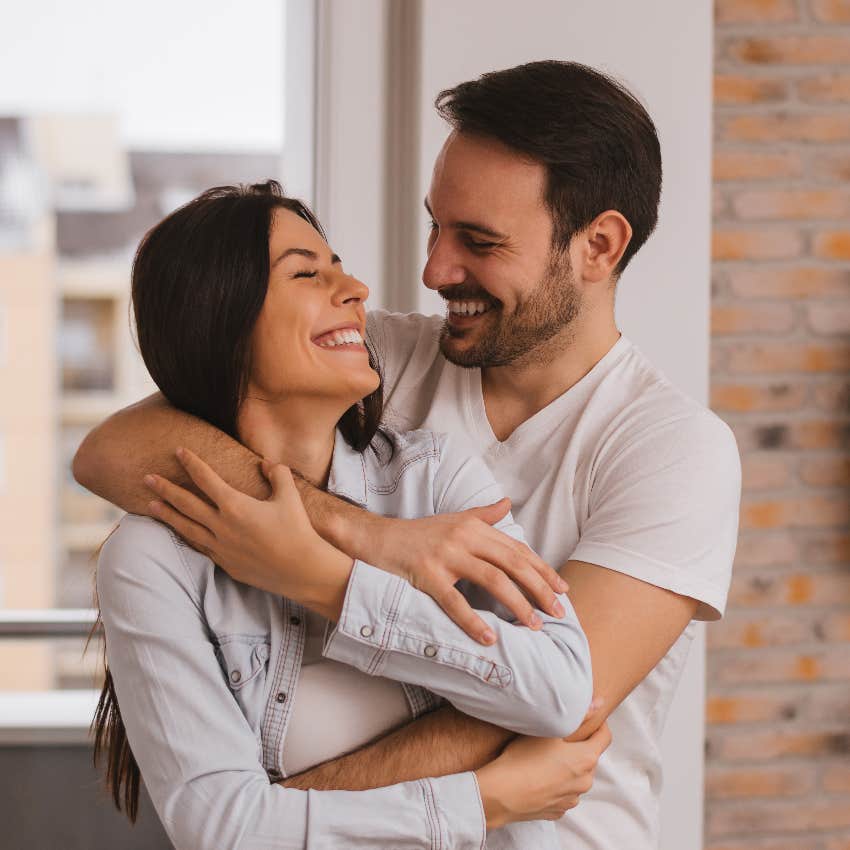 Happy couple hugging