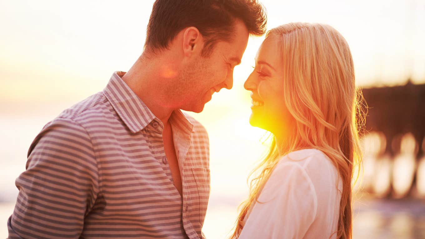 Yes, A Hookup Can Lead To Commitment — Here's Why couple on beach
