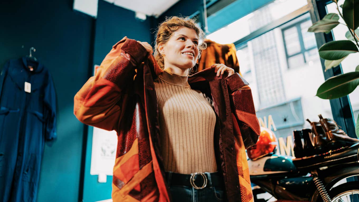 Woman shopping for new clothes to be more feminine