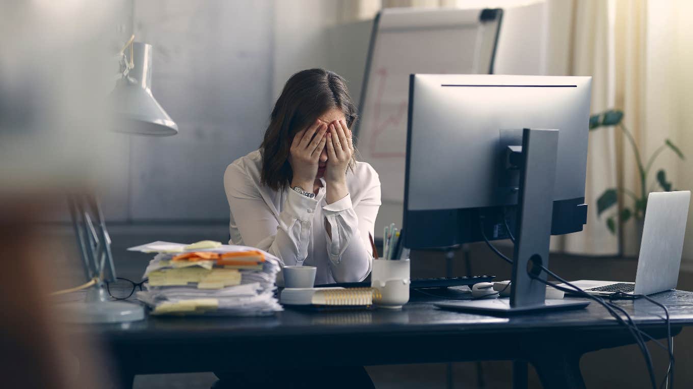 Woman stressed out at soul-sucking job