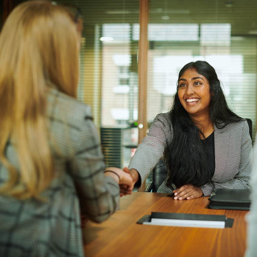 job candidate shaking hands with hiring manager