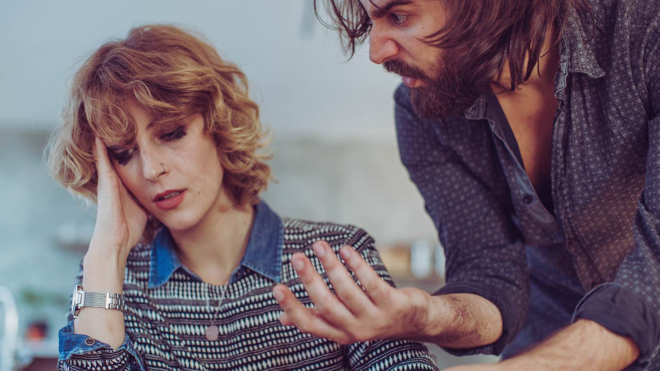 woman and furious man breaking up 