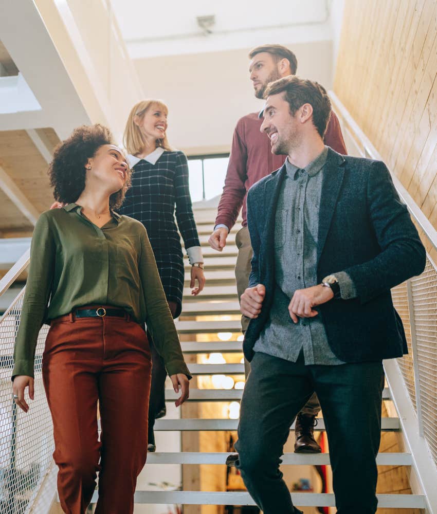 coworkers walking down stairs