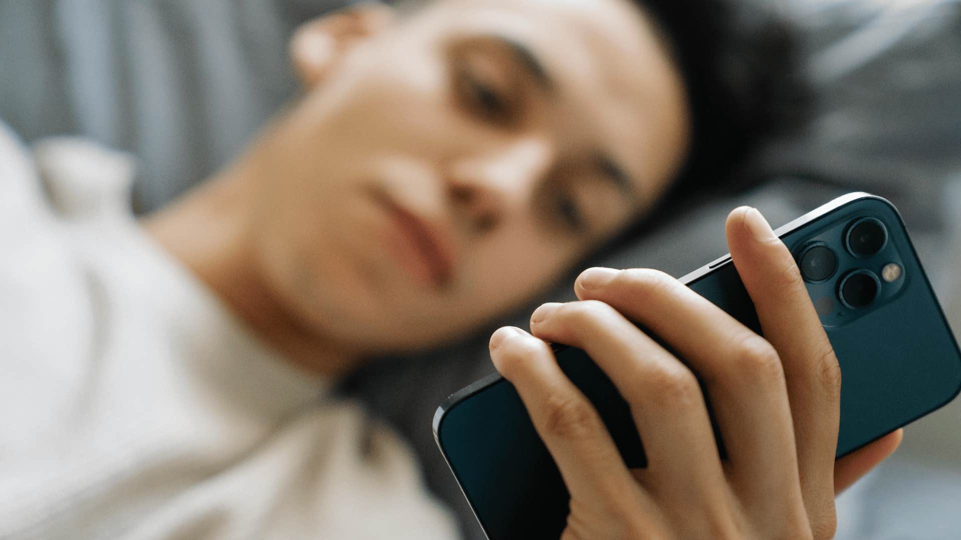 man glued to phone