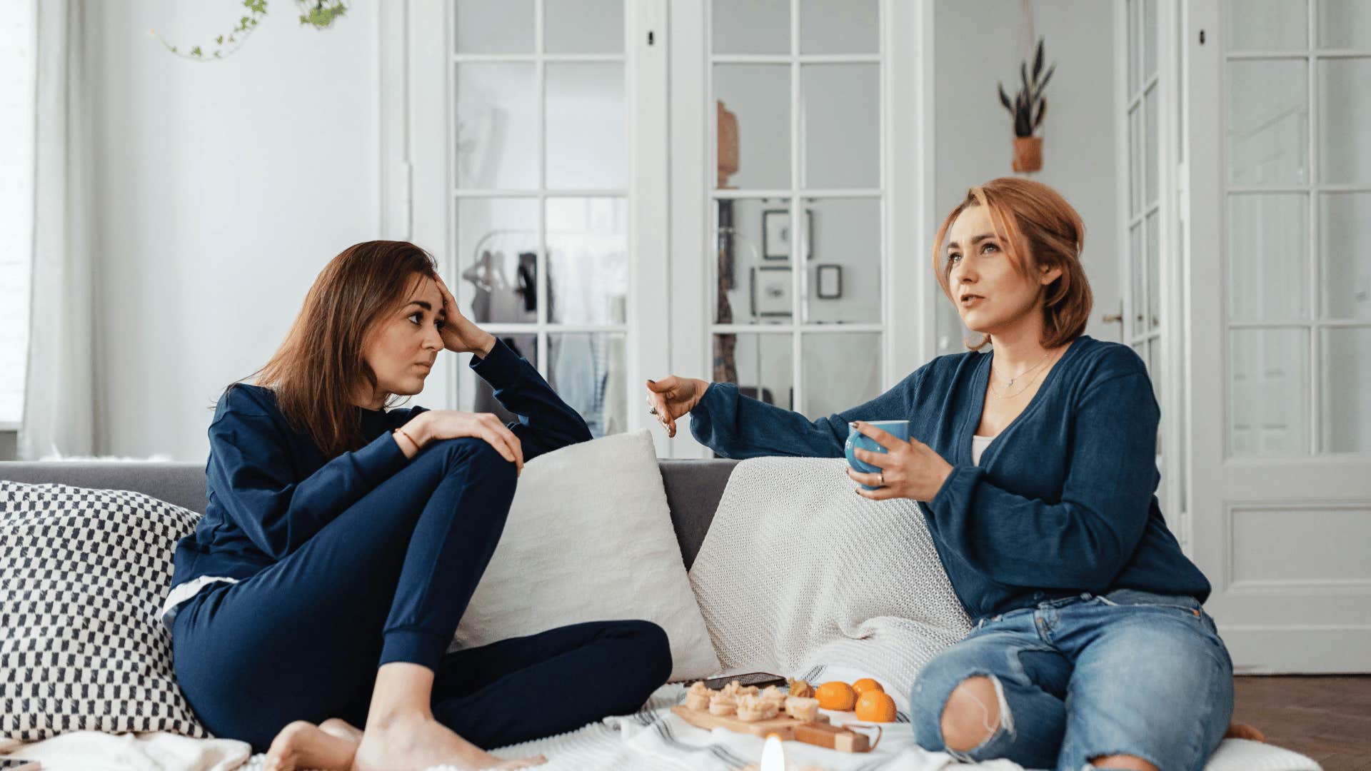 female friends having serious conversation