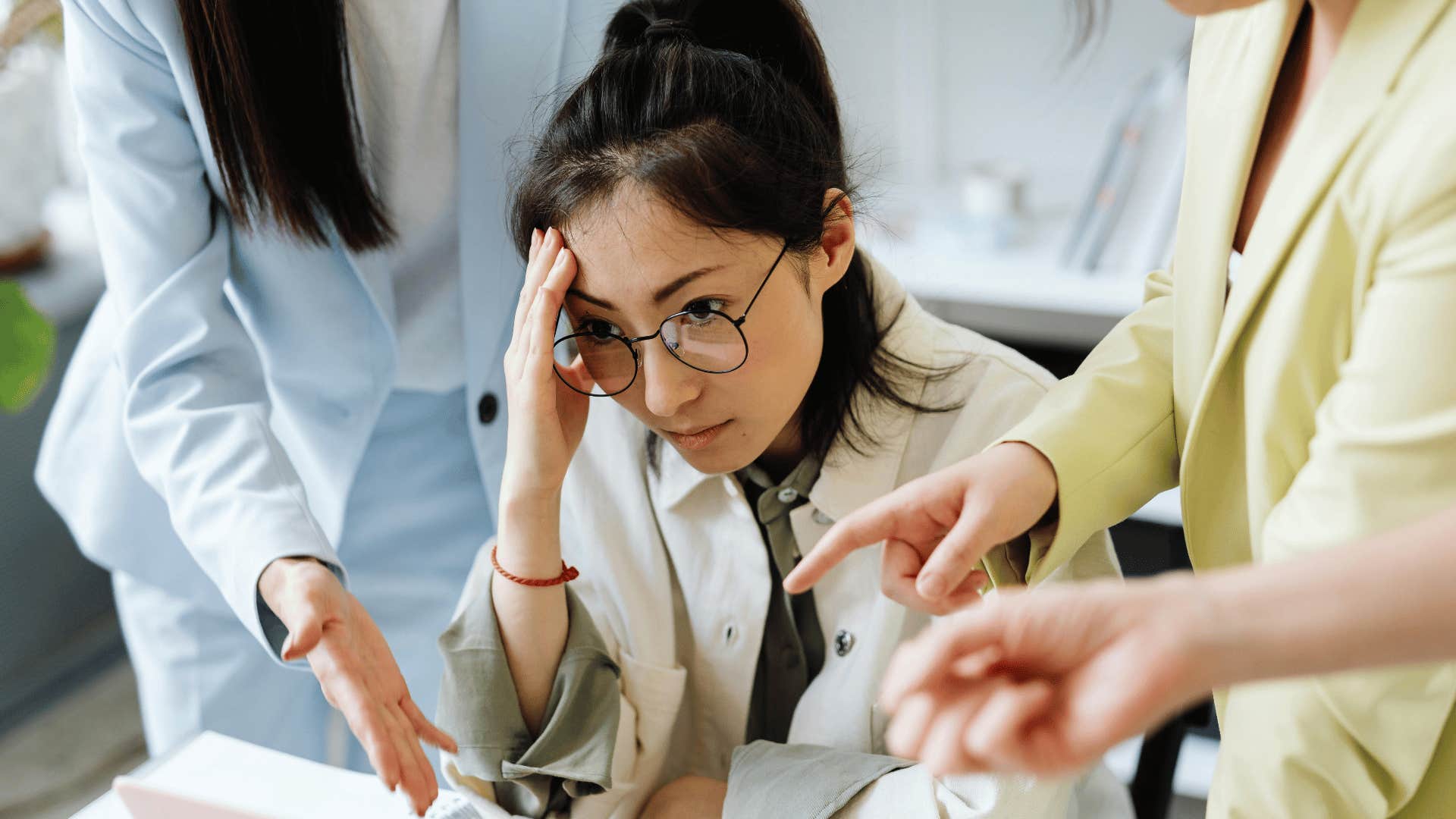 stressed woman being told what to do