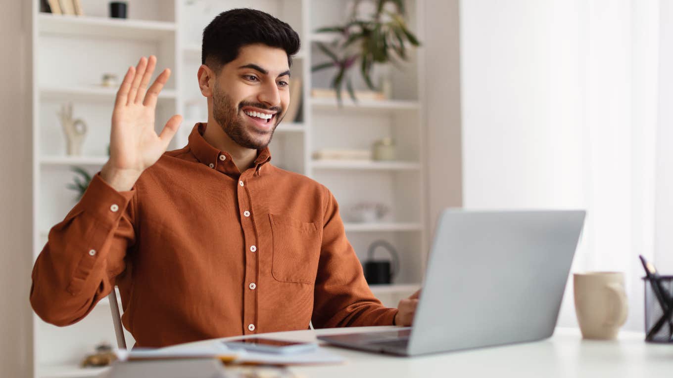 Man being interviewed for job by AI