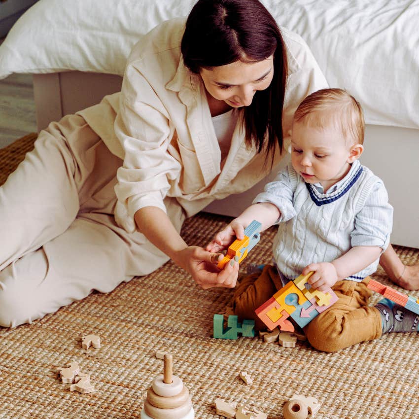 mom playing blocks with baby