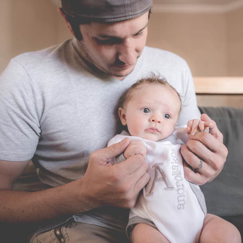 teen dad with baby