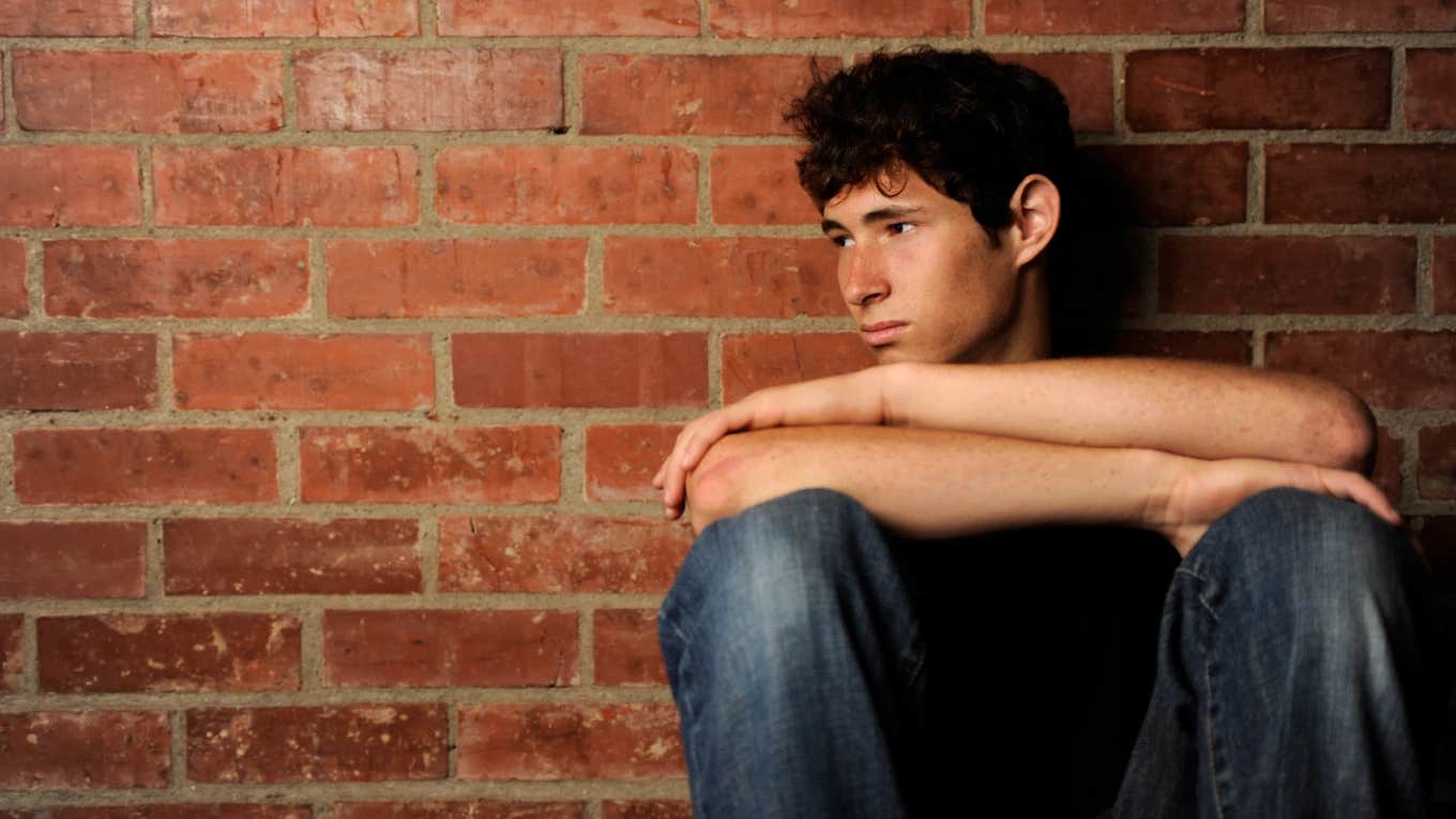 Mom Wants To Punish Her Son For Becoming A Teen Parent distraught teen boy dealing with teen pregnancy