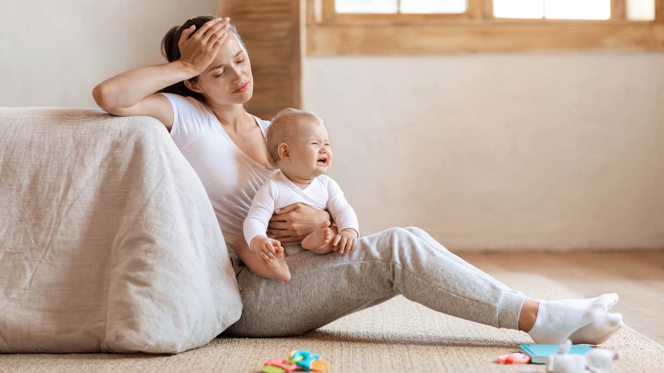 Mom Was Laid Off From Her Job One Hour After Being Back From Unpaid Maternity Leave tired new mom laid off from her job