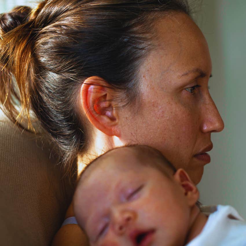 sad mom with baby on mother's day