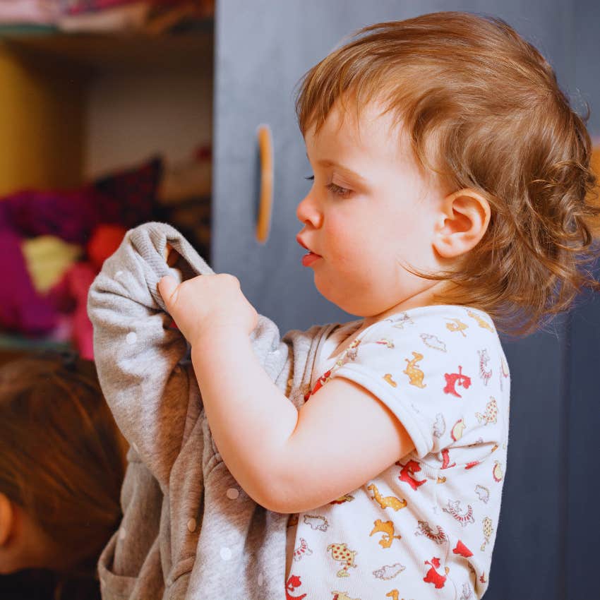 child getting dressed