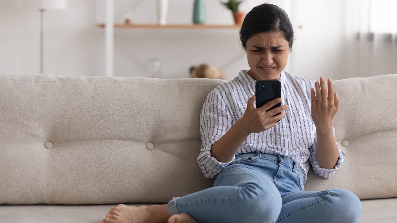 Confused woman reading a text