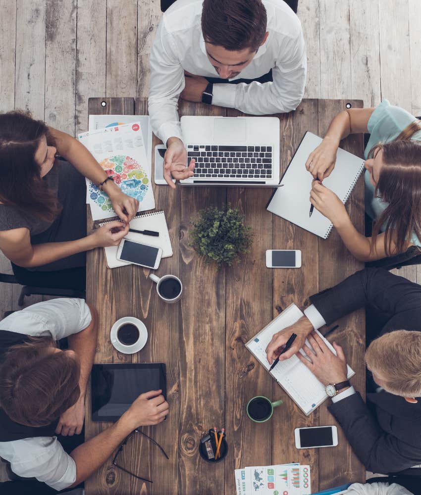 coworkers sitting at a table